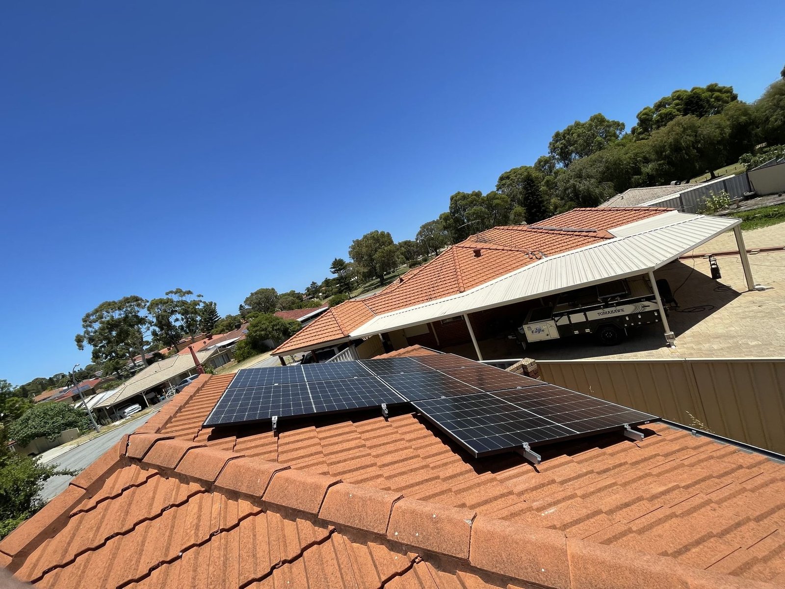 Residential solar panels on a tiled roof